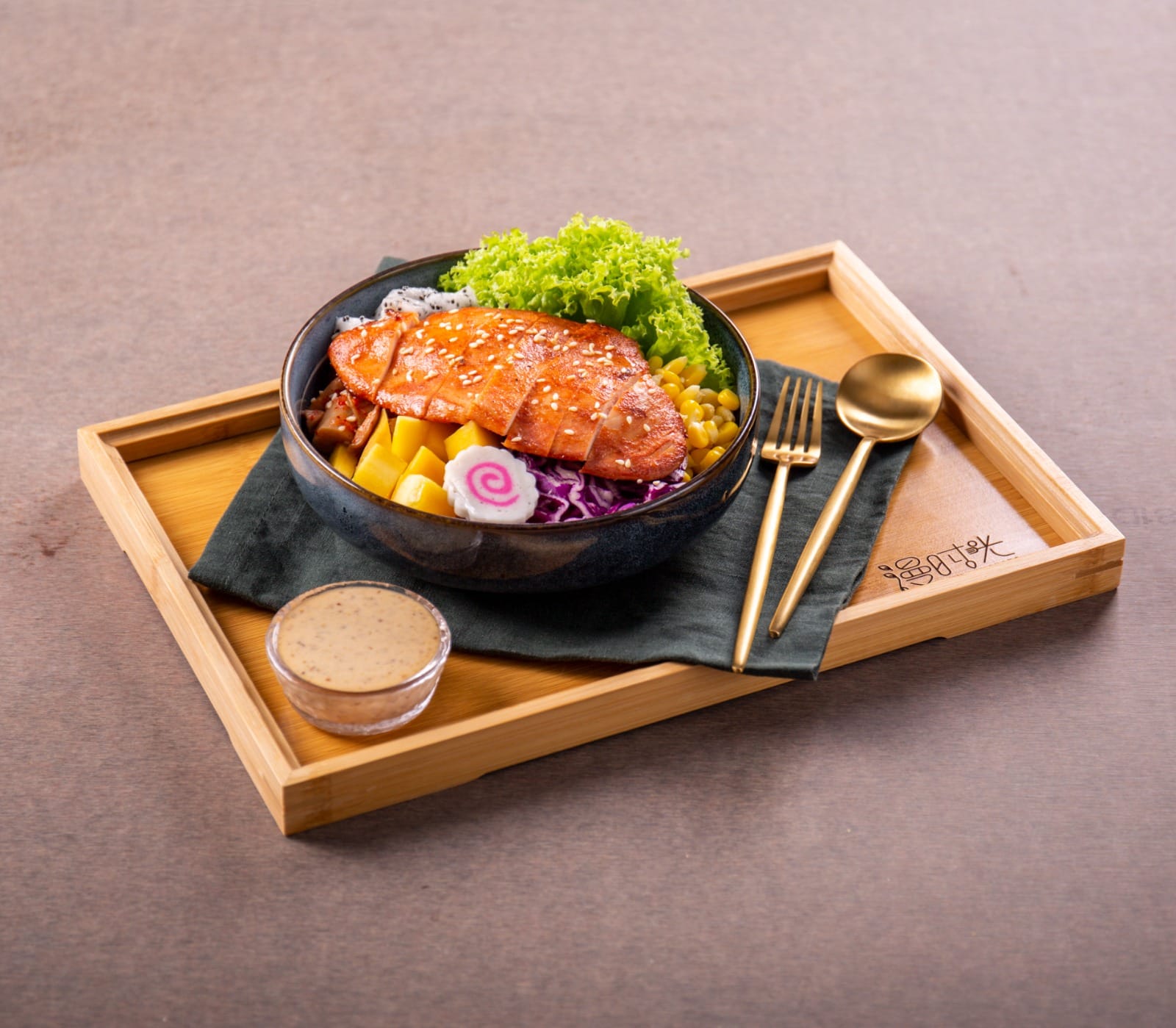 New Orleans chicken breast light-meal bowl with corn, mango and purple cabbage